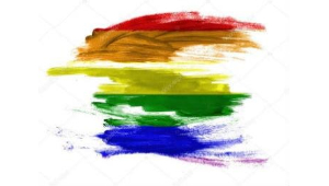 La imagen muestra una mancha difuminada con los colores de la bandera LGBTQ+.
